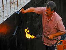 Drenaža - varenje bitumenske trake uz temelj